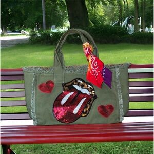 Leopard Rolling Stones Patch Fringe bag 
Custom Made, One of a Kind